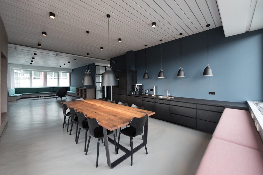 What is the impact of lighting on commercial interior design?